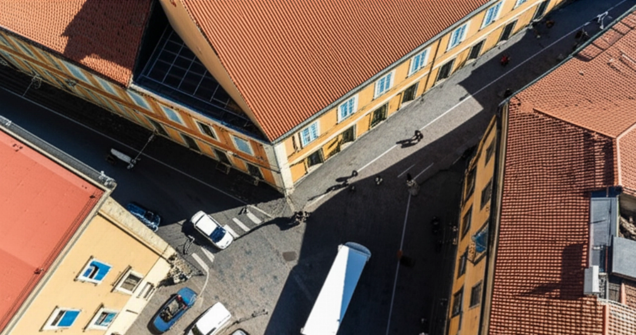 Vista aérea hiperrealista de un camión de mudanzas estacionado en el centro histórico de Sassari.